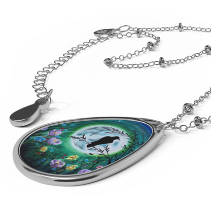 Moonlit Garden Oval Necklace — Silver Teardrop Pendant with Raven Silhouette